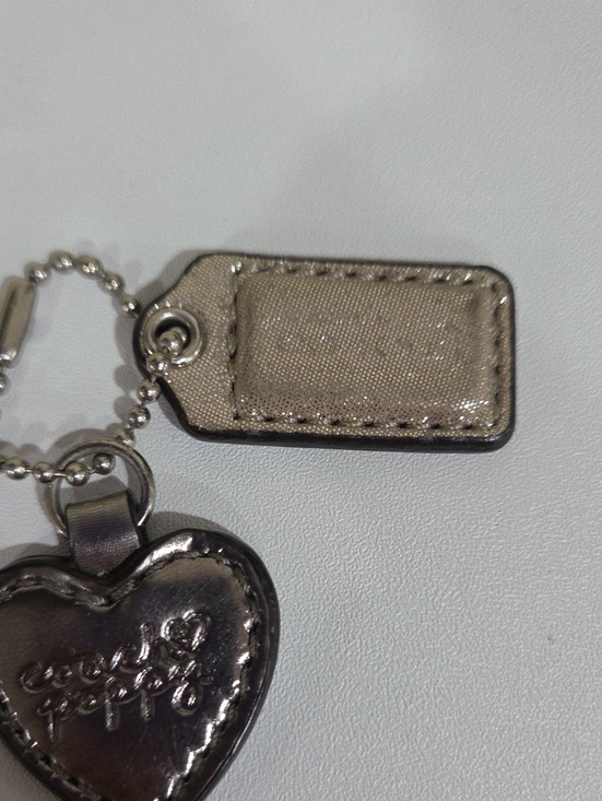 Coach Accessories - Coach Poppy Rsre Script Metallic Leather Heart and Hangtag